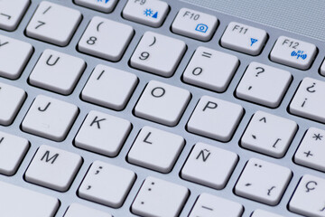 Partial view of a laptop keyboard