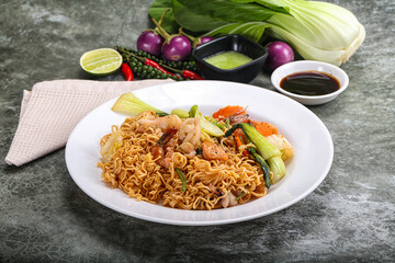 Asian cuisine - Fried noodles with seafood