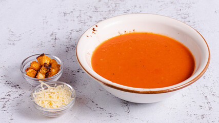Tomato soup bowl top view isolated