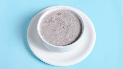 Mushroom soup bowl top view isolated