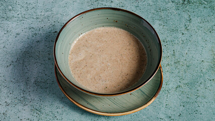 Mushroom soup bowl top view isolated
