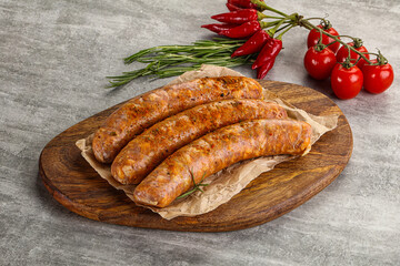 Raw sausages with spices and herbs