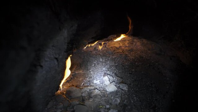 Natural gas burns at night in the mountains of Turkey, called chimera lights in Cirali