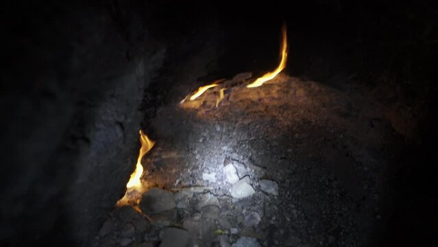 Natural gas burns at night in the mountains of Turkey, called chimera lights in Cirali