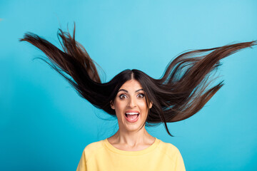 Photo of attractive model lady demonstrating ideal neat long hairstyle flying on air after...