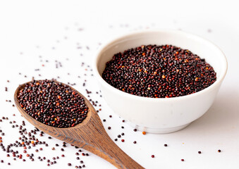 Organic Black Quinoa on a Wooden Spoon. Healthy Eating Concept. View from Above.