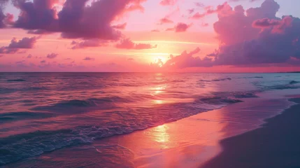Foto op Plexiglas Background Deep hues of pink and orange adorn the sky as the sun sets over the ocean creating the perfect backdrop for a romantic getaway. © Justlight