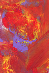 Abstract background of acrylic paint in purple, red and yellow tones.