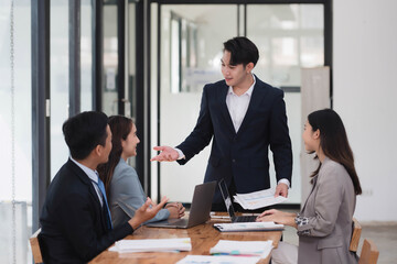 Professional business formal meeting conference discussion with coworkers and shareholders in the meeting room.