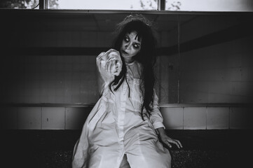 Portrait of asian woman make up ghost,Scary horror scene for background,Halloween festival...