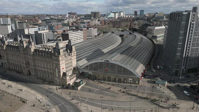 Aerial view of Liverpool Lime Street Station and Radisson RED Liverpool Hotel, Merseyside, England, slow orbit