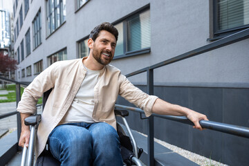 Disabled man on a wheelchair looking positive and smiling
