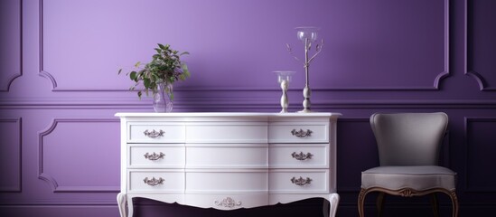 A white dresser sits next to a white chair in a stylish room, creating a clean and modern aesthetic. The simple and elegant design of the furniture enhances the overall decor of the space.