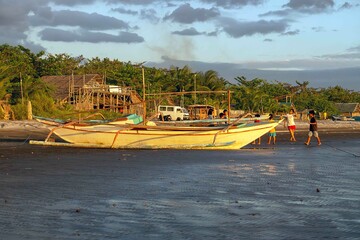 landscape view of boats on the beach