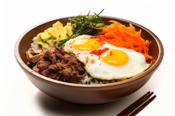 Juicy bibimbap on a porcelain platter against a white background