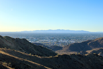 Late afternoon in the west side of Valley of the Sun, view of Glendale, Peoria and Phoenix from North Mountain Park, Arizona, backlit shot