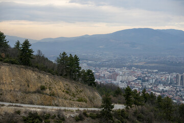 Fototapeta premium mountain road leading to the European city of Skopje, the capital of North Macedonia