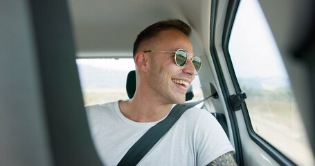 Happy man, car and sunglasses on road trip in backseat for travel, journey or adventure in the...