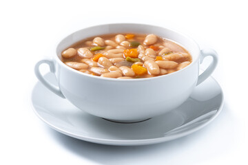 white beans soup with vegetables in white bowl isolated on white background.
