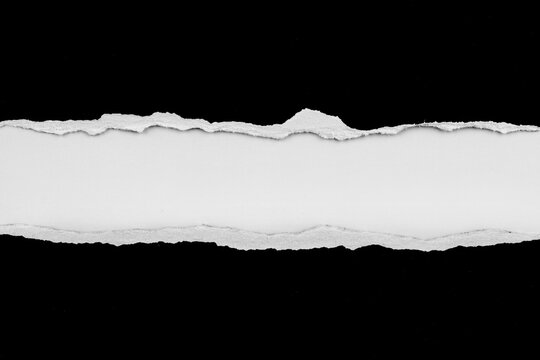 Gap in ripped black paper