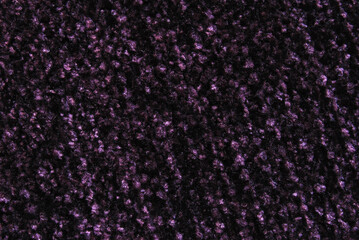 Purple fluffy velvet chunky knit fabric pattern as background
