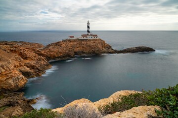 Fototapeta na wymiar long exposure view of the Cap de Cala Figuera lighthouse