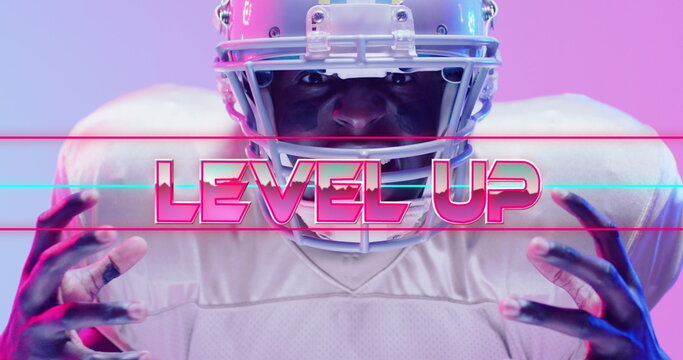 Image of level up text over american football player and neon lines