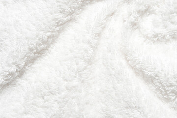 White shower towel texture. Fluffy carpet background. Blank bathroom textile. Warm sweater natural material. Soft baby fabric backdrop detail. Grey flat surface. Home canvas design