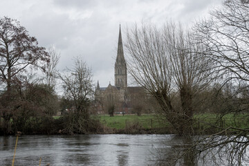 view of Salisbury cathedral Britain’s tallest spire across the River Avon Wiltshire England