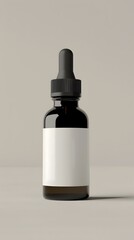 Essential Oil Bottle with Black Cap on a Grey Surface