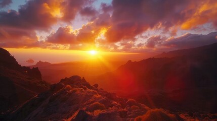 Beautiful sunset over a mountain range, ideal for travel and nature concepts - obrazy, fototapety, plakaty