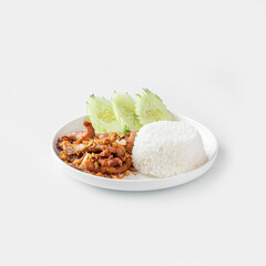 Fried pork with garlic on rice in a white plate on a white background