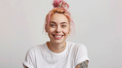 joyful young woman with a big smile, against a neutral background. - obrazy, fototapety, plakaty