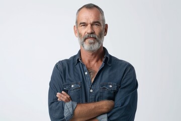 Obraz premium A man with a beard wearing a denim shirt. Suitable for casual fashion concept