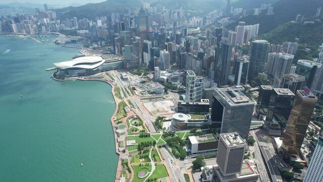 Aerial drone skyview of Hong Kong West Kowloon Victoria Harbour Financial Tsim Sha Tsui Hung Hom Central Admiralty Wan Chai Happy Valley Wong Nai Chung Stadium Tai Hang Causeway Bay Tai Hang