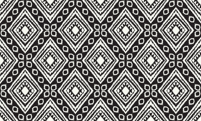 Hand drawn Ikat, geometric folk ornament.African tapestry, tribal ethnic vector texture, seamless pattern in Aztec style, folk embroidery, Indian batik, Mexican decoration.