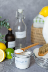 Eco-friendly cleaning products white vinegar, baking soda, lemon, brush. Green cleaning alternatives on different surfaces remove stains. Conscious and environmentally friendly. Zero waste concept.