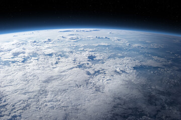 Cloudy Earth in space. The Earth surface is covered by clouds. Elements of this image furnished by...