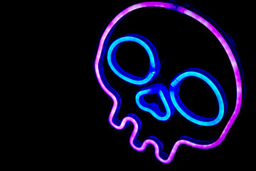 led neon skull light with black background 
