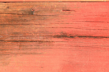Old Wood planks texture with red color background. Close up wooden with paint surface. Wooden floor or wall detail.