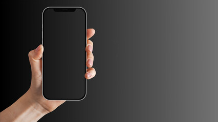 Hand holding cell phone mockup with blank screen. Smartphone mock up isolated on black bacground