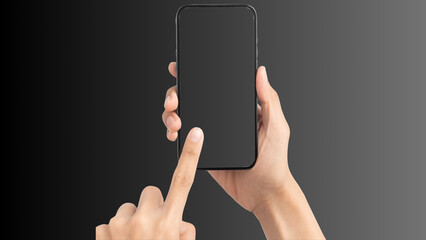 Hand holding cell phone mockup with blank screen. Smartphone mock up isolated on black bacground