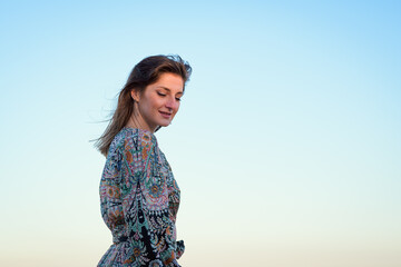 Woman With Long Hair Standing on Beach