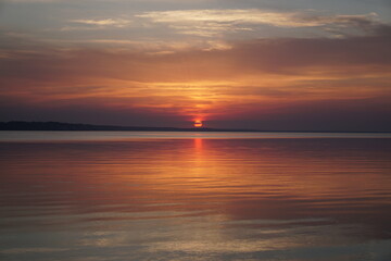 Fototapeta na wymiar sunset at the beach. sunset in the sea. sunset over the sea. 