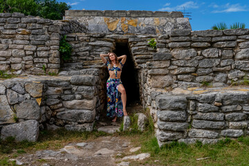 Ethereal Journey: A Young Beauty's Sojourn through Xcambo Mayan Ruins in Telchec, Yucatan, Amidst a Caribbean Oasis