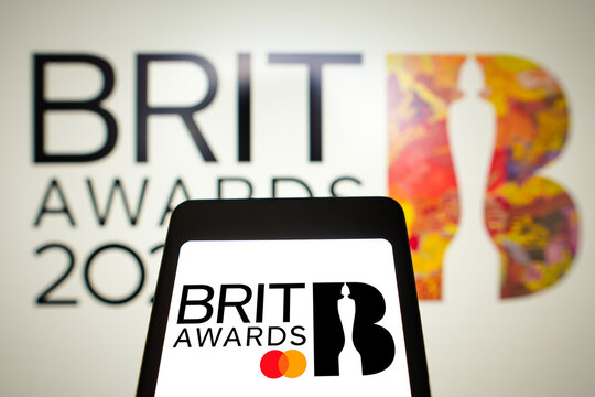 February 28, 2024, Brazil. In this photo illustration, the Brit Awards logo is displayed on a smartphone screen and in the background.