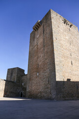 The Castle of Olivenza under blue sky