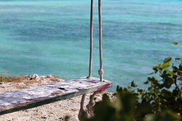 Fototapeta premium Swing at the shore, Mangel Halto Aruba.