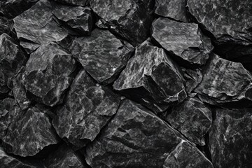 Detailed black and white photo of a rock wall. Suitable for backgrounds or textures