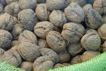 Sack with plenty of nuts in a local market